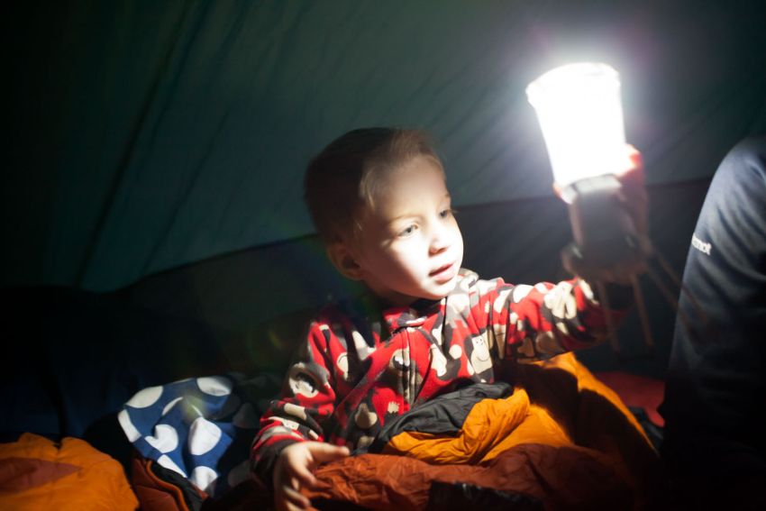 setting up tent with child